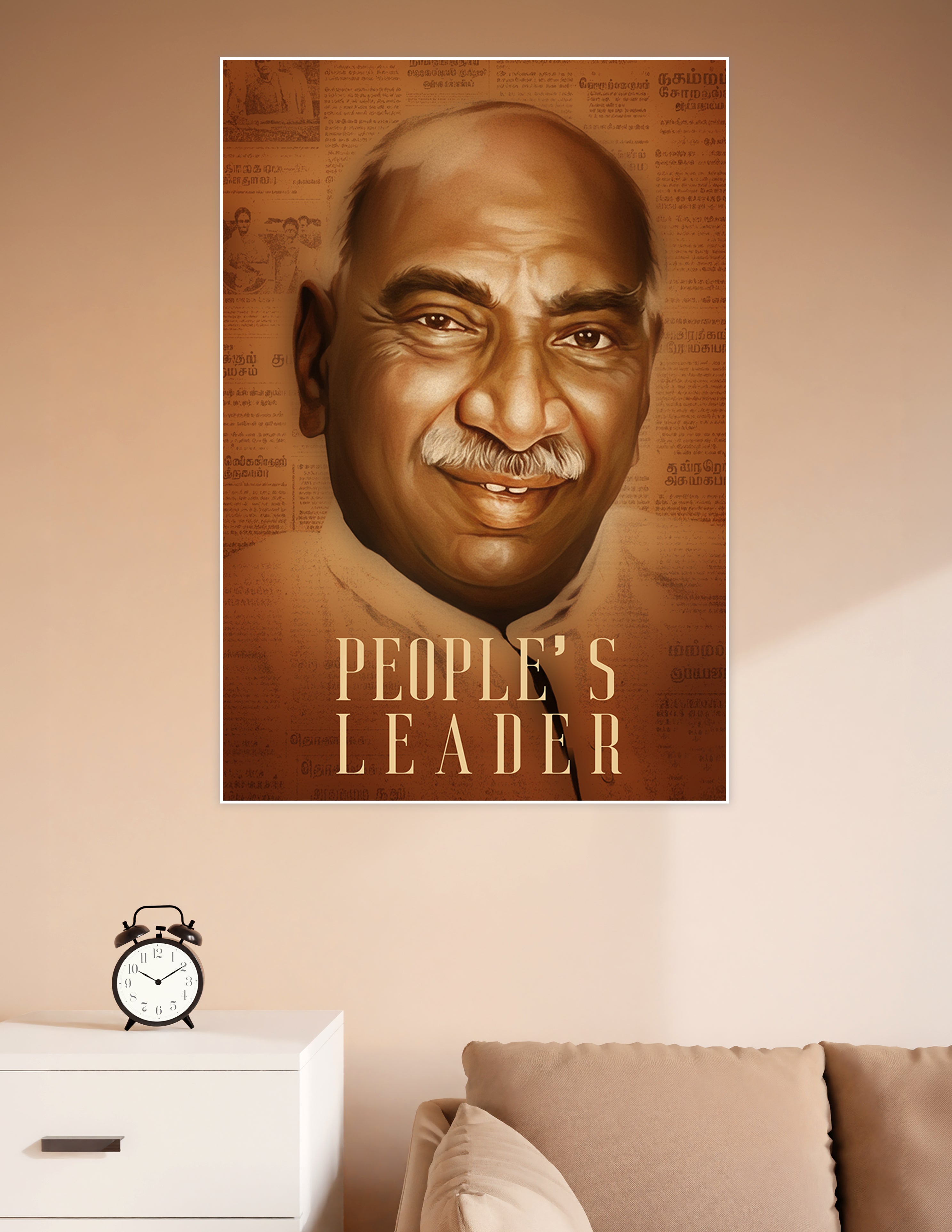 Sepia-toned portrait poster of a smiling Tamil people's leader with vintage Tamil newspaper background and bold 'People's Leader' title