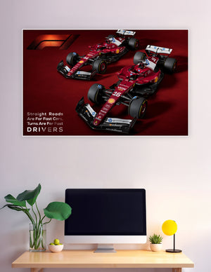 Two Ferrari Formula 1 cars in iconic red livery with sponsors on a dark red background and the motivational quote Straight Roads Are For Fast Cars Turns Are For Fast Drivers