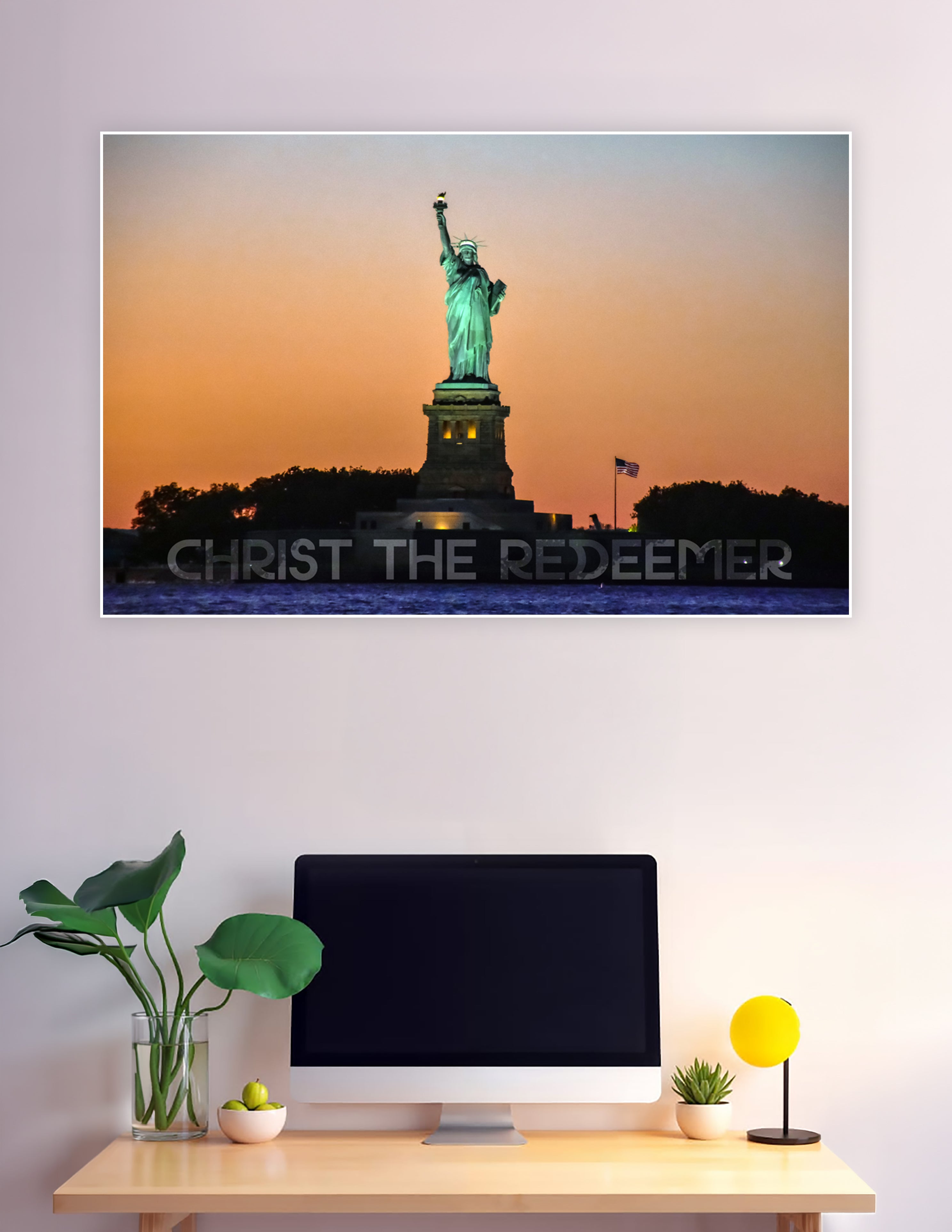 Statue of Liberty glowing at sunset over New York Harbor