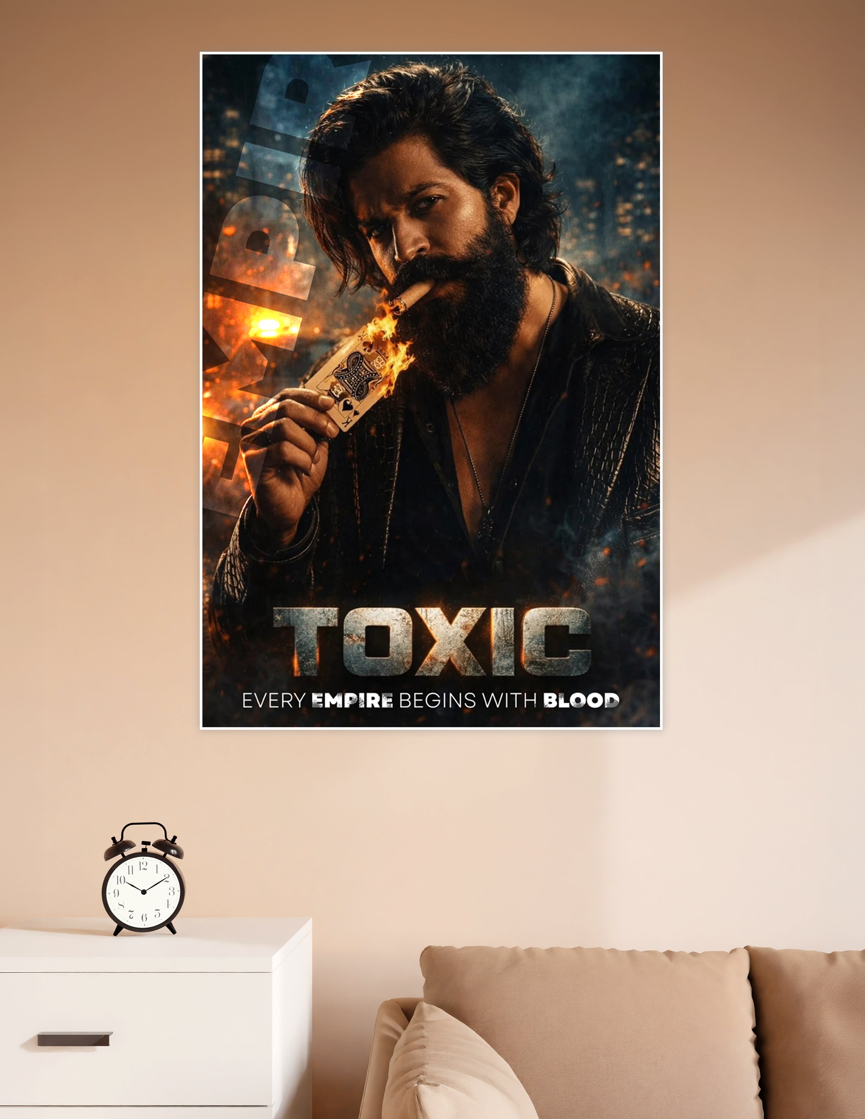 Toxic movie poster featuring a bearded man lighting a playing card on fire with the tagline Every Empire Begins With Blood