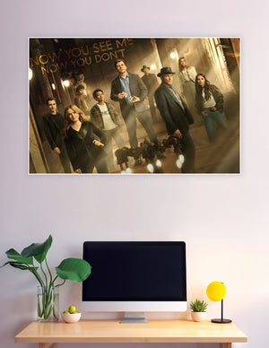 Now You See Me Now You Don't movie poster featuring the full ensemble cast in a dramatic golden-lit theatrical setting