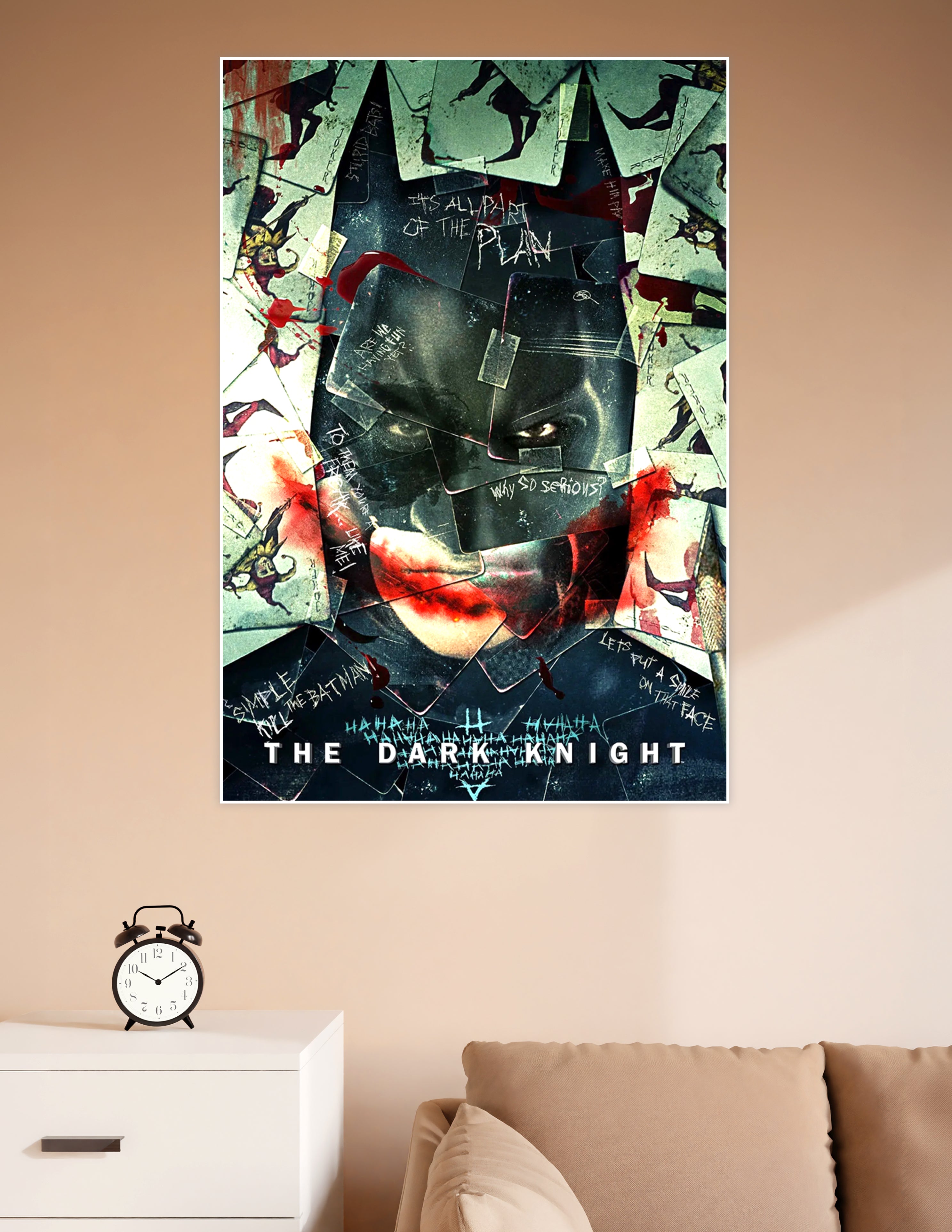 The Dark Knight movie poster featuring the Joker's face composed of shattered playing cards, blood splatter, and handwritten quotes including 'Why so serious?' and 'It's all part of the plan', with Batman's silhouette outline