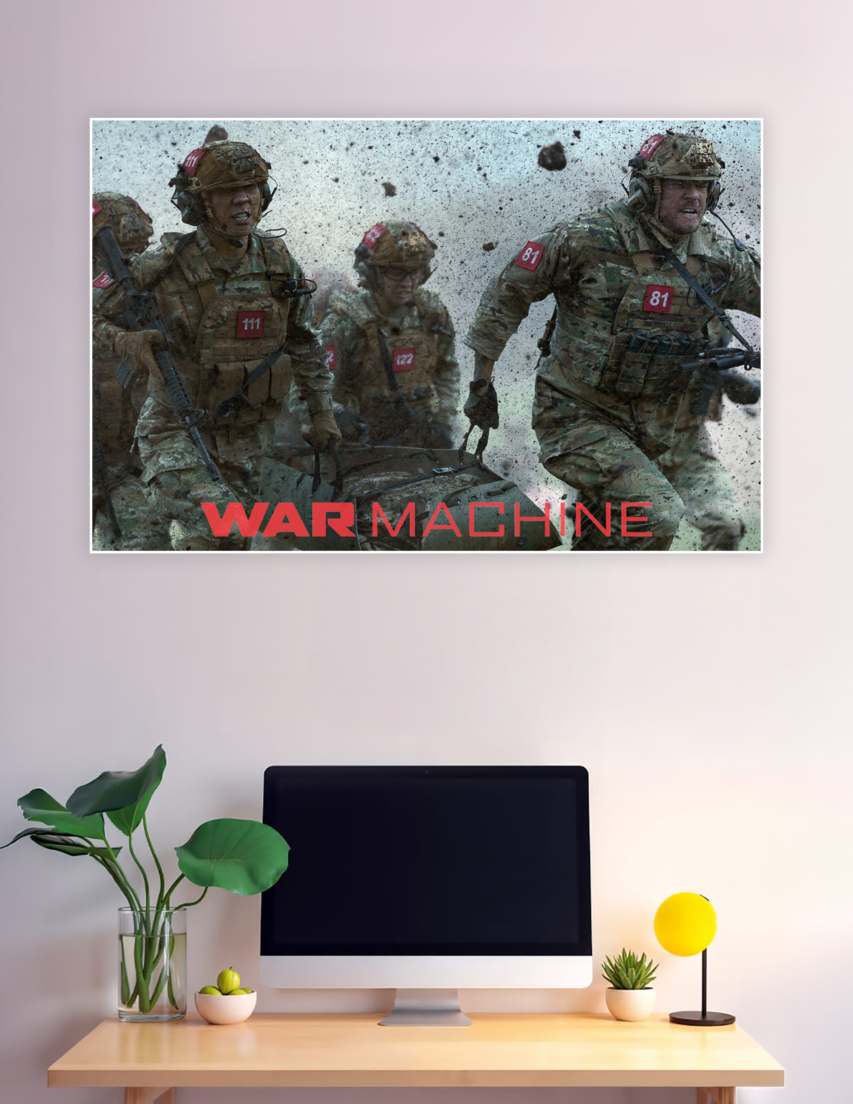 War Machine movie poster showing soldiers in camouflage gear with numbered red badges charging through an explosive battlefield with debris flying