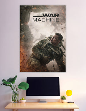 War Machine movie poster showing a soldier in tactical gear charging through fire and explosive destruction with the title text overhead