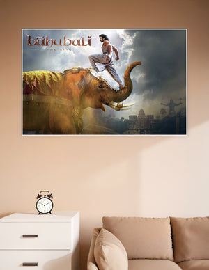 Baahubali The Epic movie poster showing a warrior standing on a decorated war elephant against a dramatic stormy sky with ancient temple silhouettes in the background