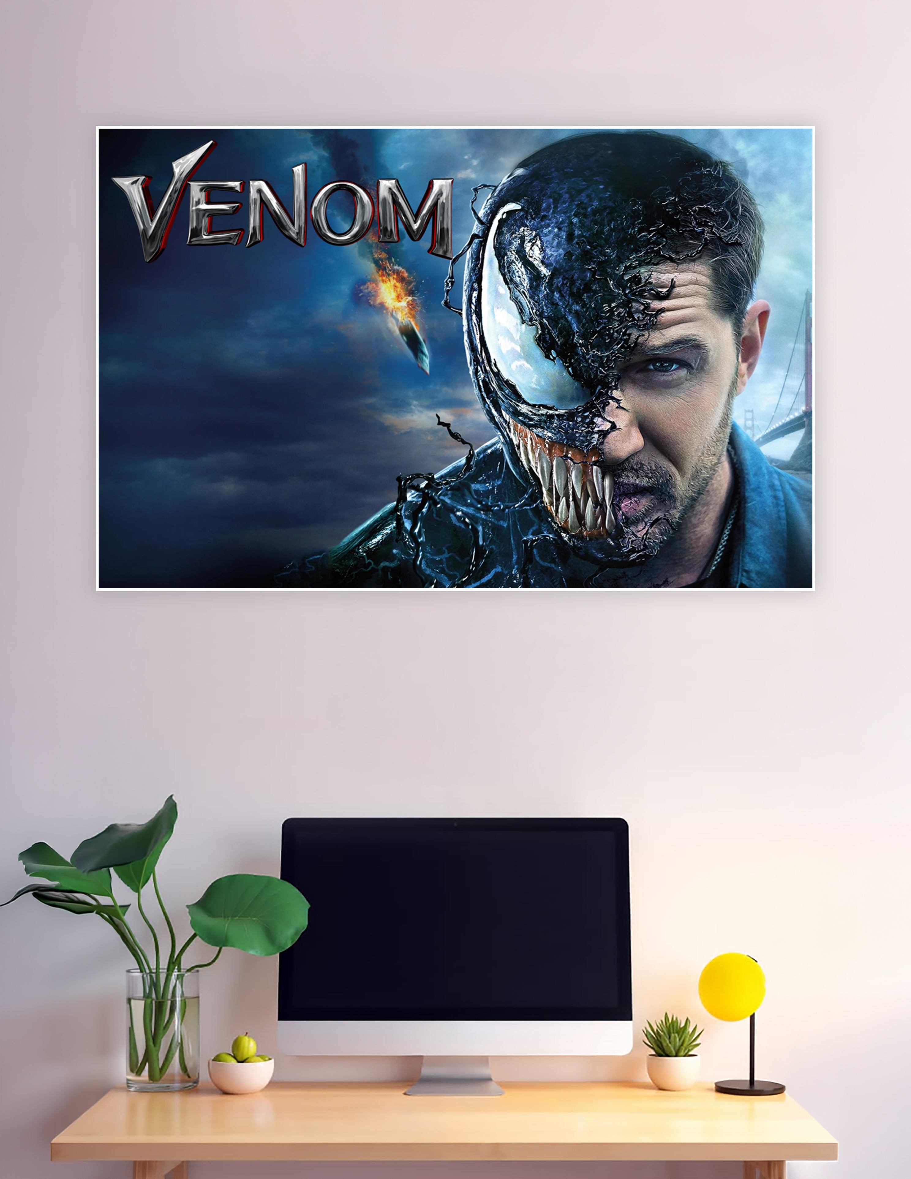 Venom movie poster with symbiote half-face transformation