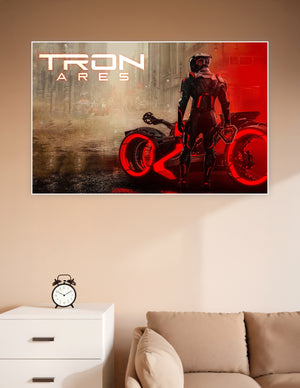 Tron Ares movie poster showing an armored figure standing beside a glowing red light cycle on a dark rainy city street