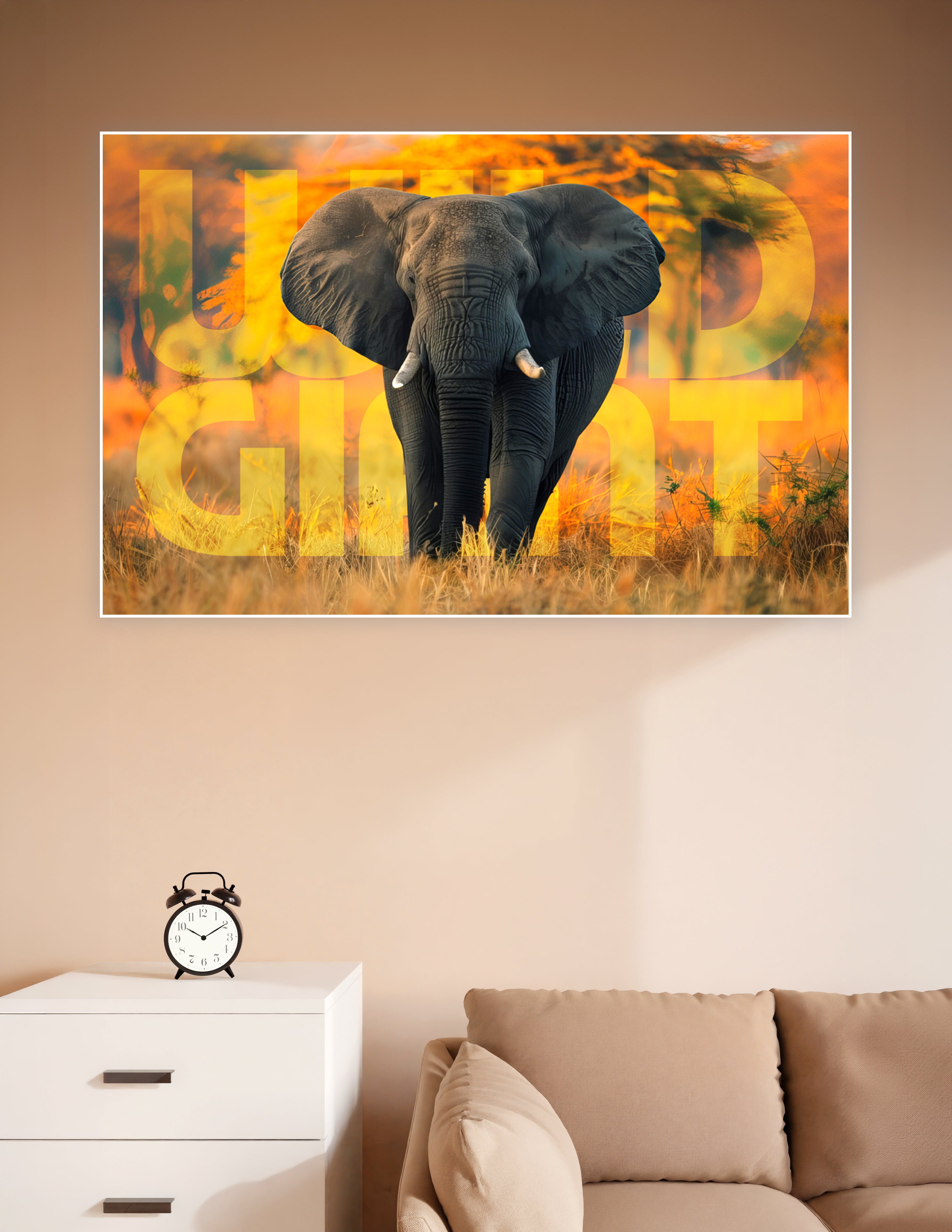 Majestic African elephant walking through golden savanna grass with warm orange autumn trees in the background and bold 'Wild Giant' typography overlay