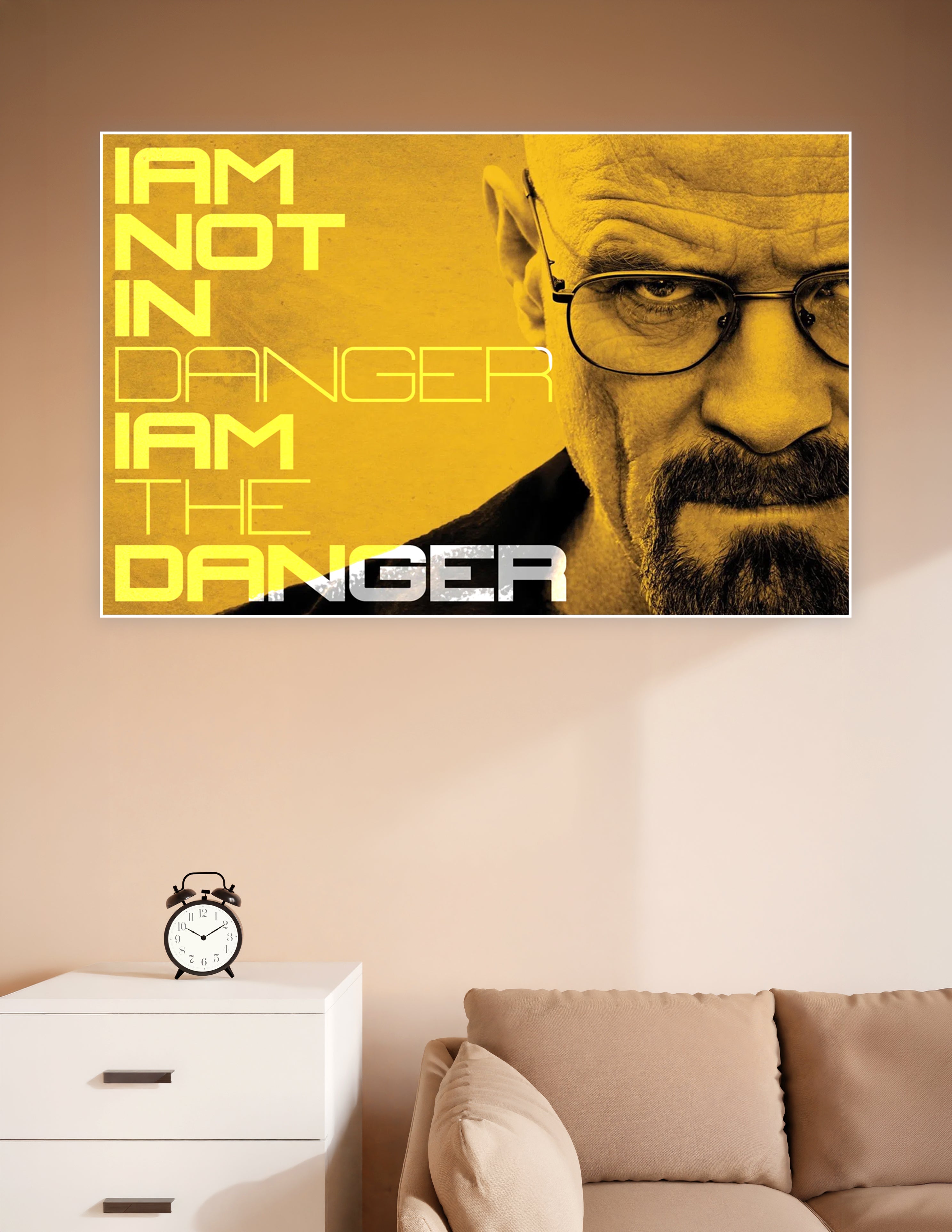 Breaking Bad poster featuring Walter White with bold yellow typography reading 'I Am Not In Danger, I Am The Danger' on a golden background