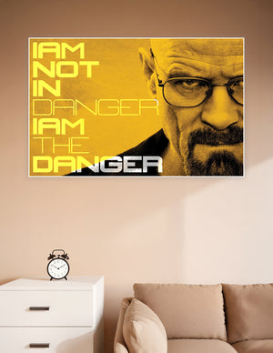 Breaking Bad poster featuring Walter White with bold yellow typography reading 'I Am Not In Danger, I Am The Danger' on a golden background