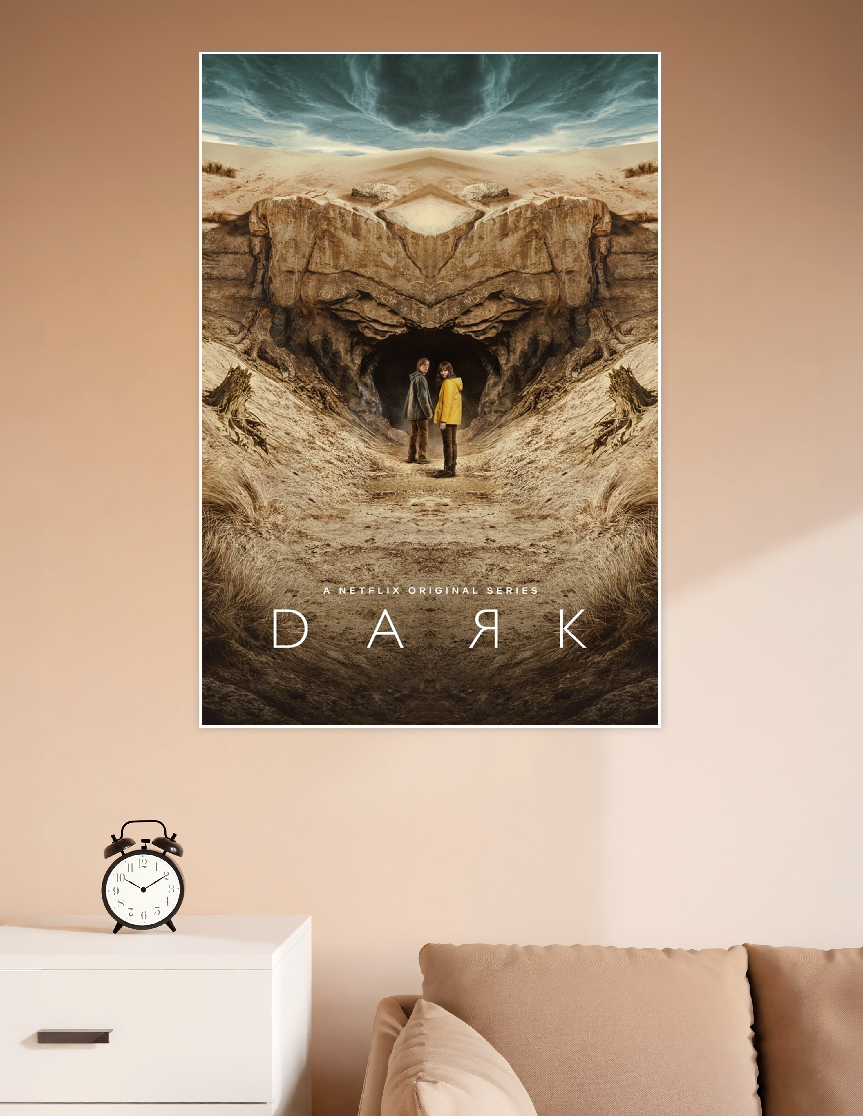Two figures in a yellow and grey jacket standing before a mysterious mirrored cave entrance in the Netflix original series Dark poster