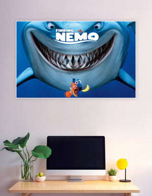Finding Nemo movie poster showing Bruce the great white shark grinning with Marlin and Dory swimming below, set against deep ocean blue background