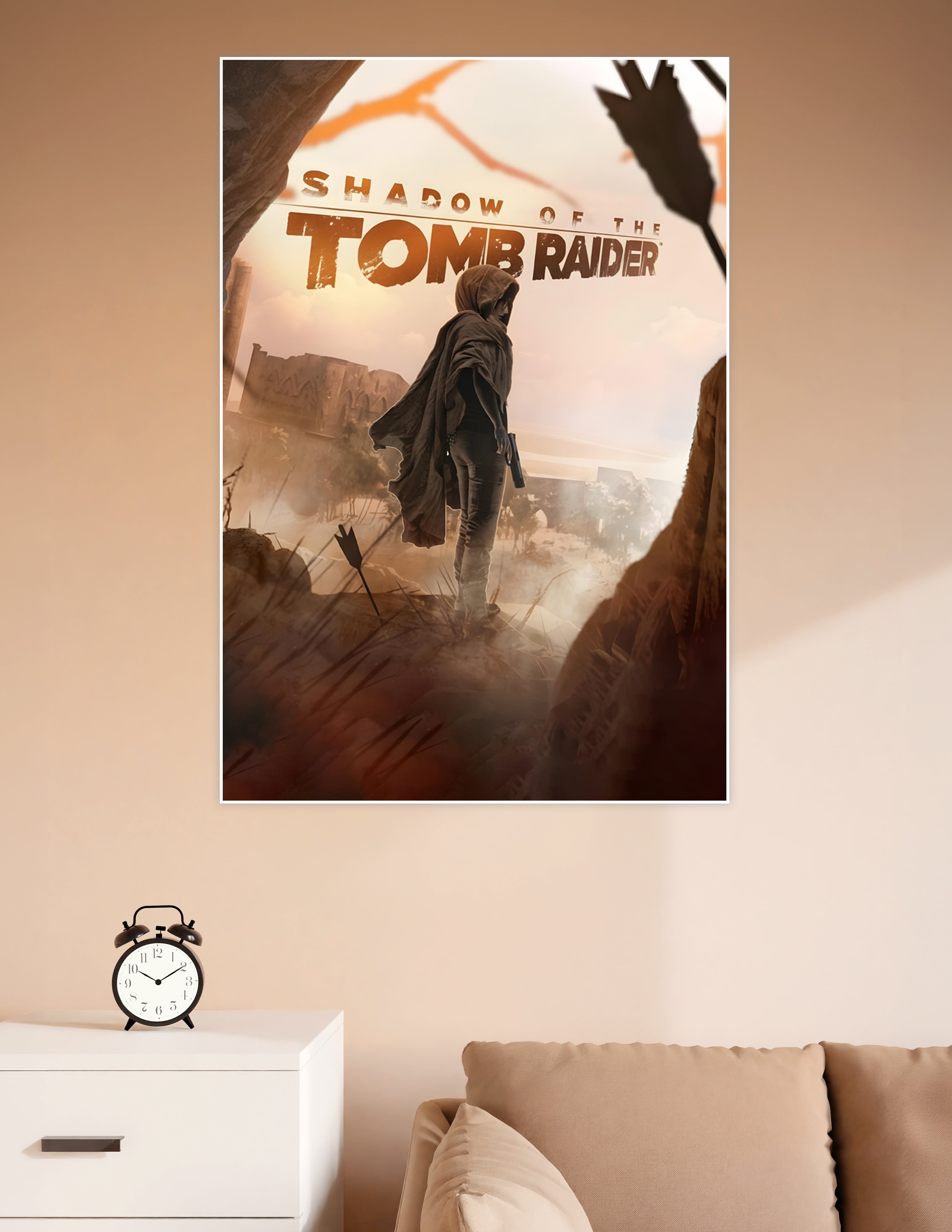 Shadow of the Tomb Raider poster showing hooded Lara Croft standing before misty ancient ruins in warm amber tones