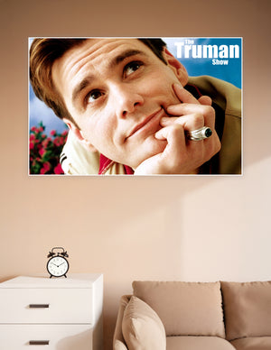 The Truman Show movie poster featuring a close-up of Truman Burbank with a curious expression against a bright blue sky