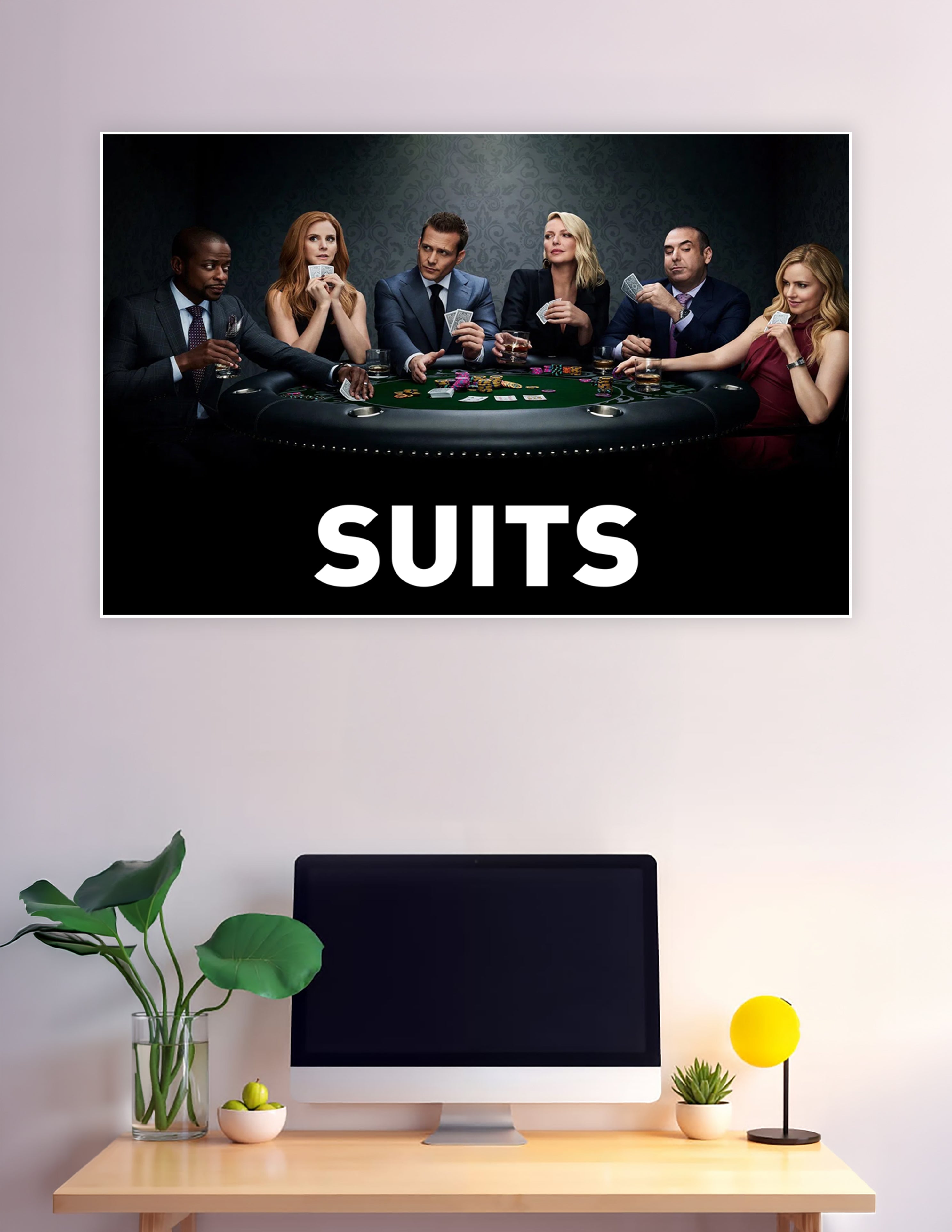Suits TV show cast seated around a poker table