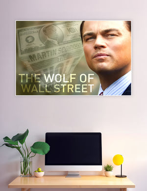 Wolf of Wall Street movie poster featuring dramatic male portrait with layered currency imagery and bold gold title typography by Martin Scorsese
