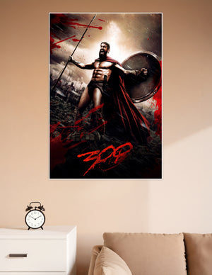 Spartan warrior in red cape holding spear and shield, roaring on a battlefield — official 300 movie poster art