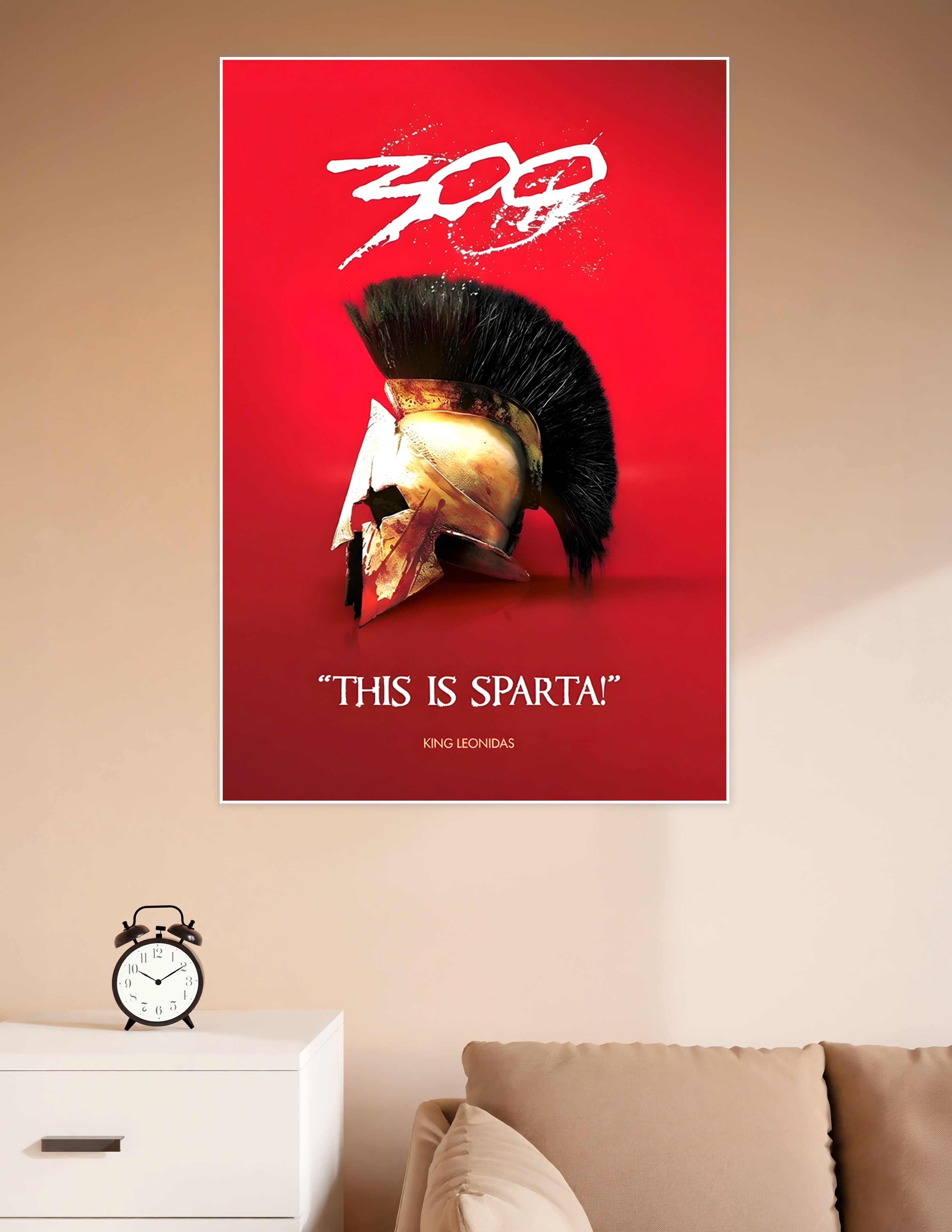 300 movie poster featuring a battle-worn golden Spartan helmet with black plume on a bold red background with the quote This Is Sparta by King Leonidas