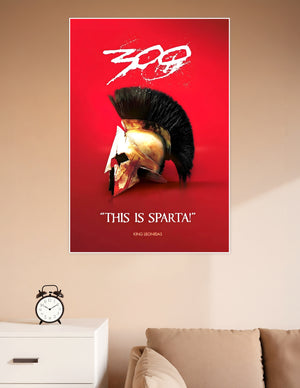 300 movie poster featuring a battle-worn golden Spartan helmet with black plume on a bold red background with the quote This Is Sparta by King Leonidas