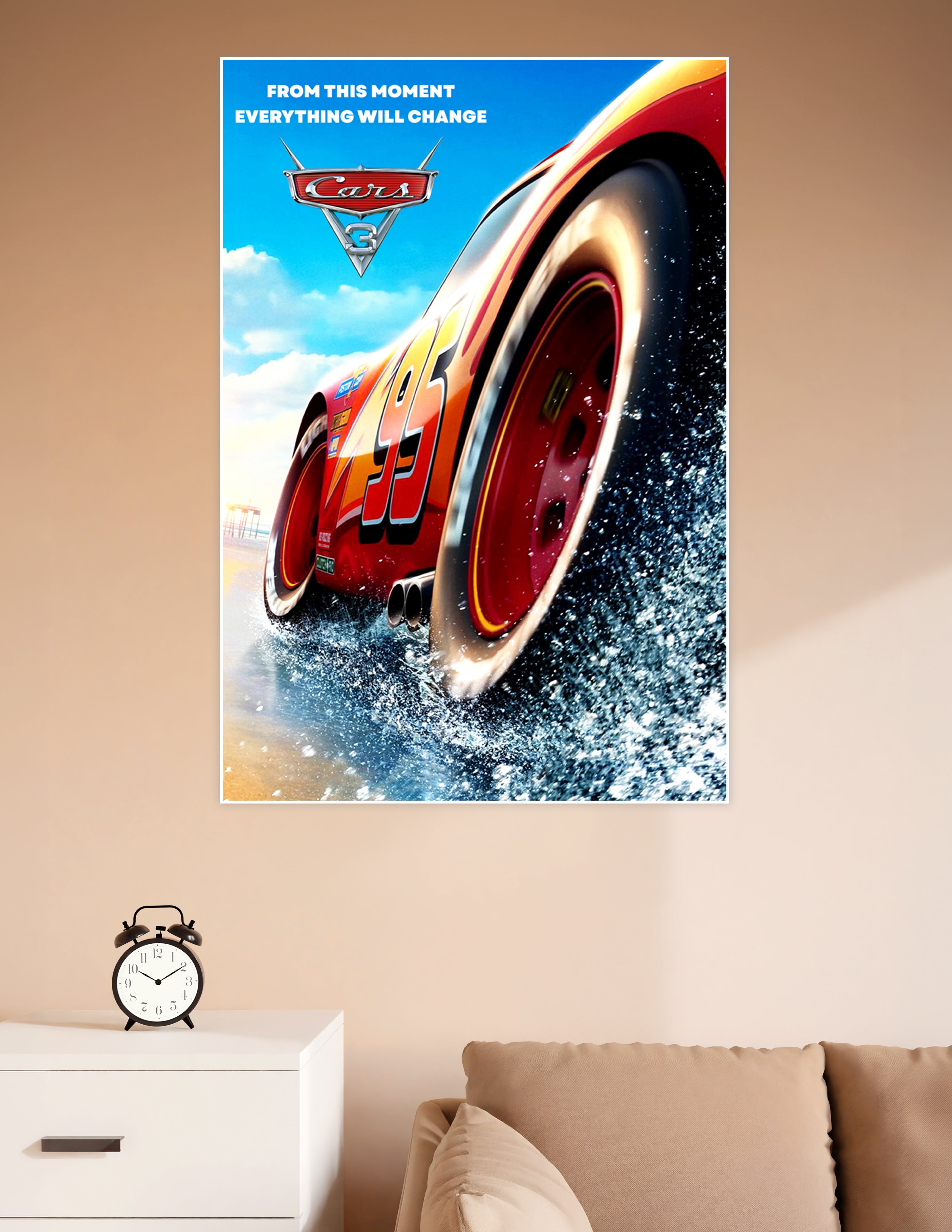 Cars 3 movie poster featuring Lightning McQueen number 95 racing through water with bold red and orange colors and the tagline From This Moment Everything Will Change