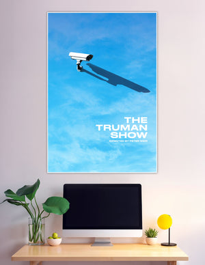 Minimalist Truman Show movie poster showing a surveillance camera casting a human-shaped shadow against a bright blue sky, directed by Peter Weir