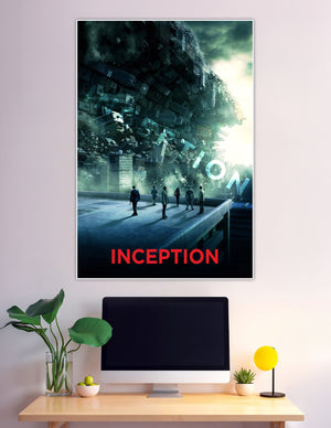 Inception movie poster showing six silhouetted figures on a rooftop watching a massive city fold and collapse into a surreal dreamscape under a glowing sky