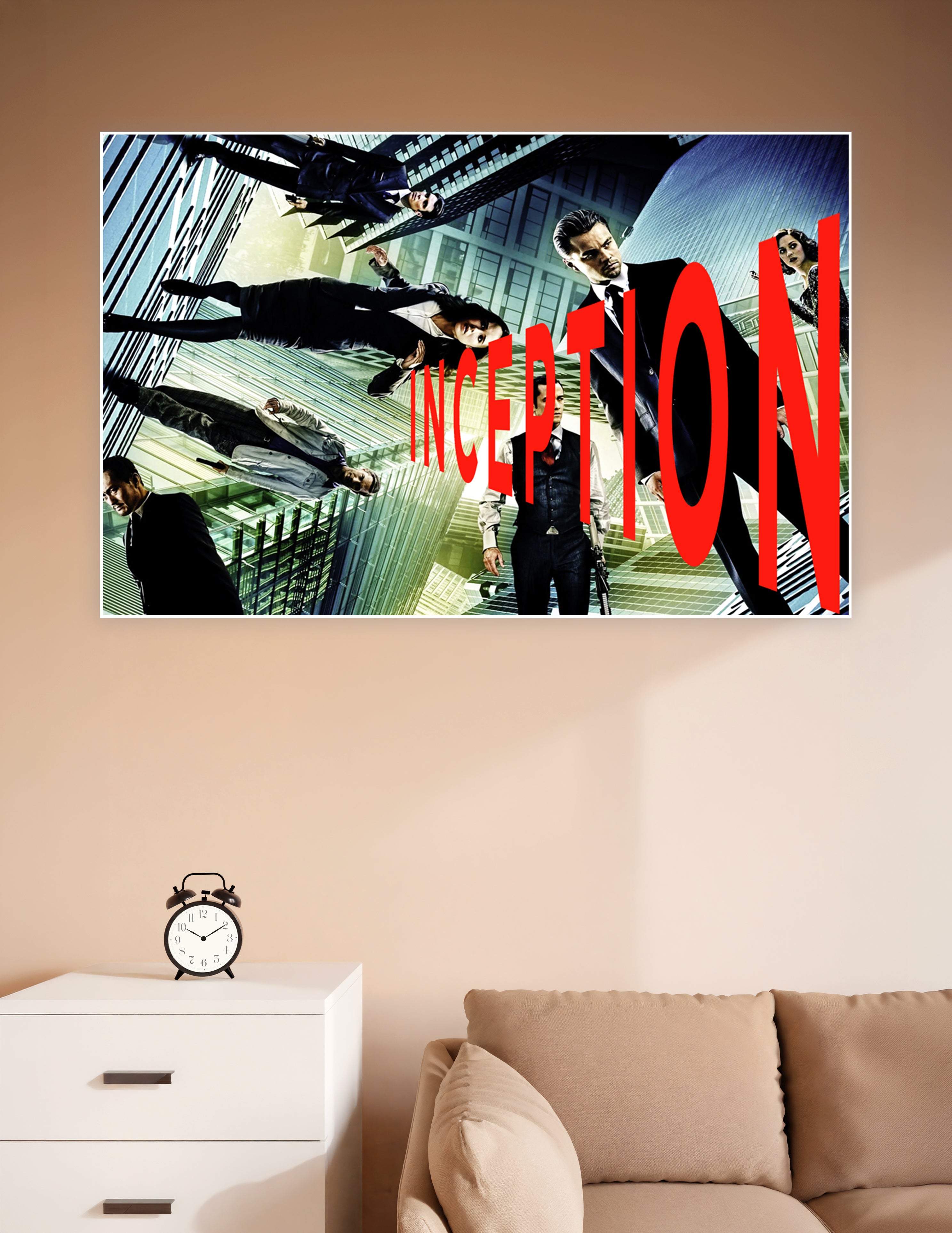 Inception movie poster featuring the cast in gravity-defying poses against a surreal folding cityscape with bold red INCEPTION title text