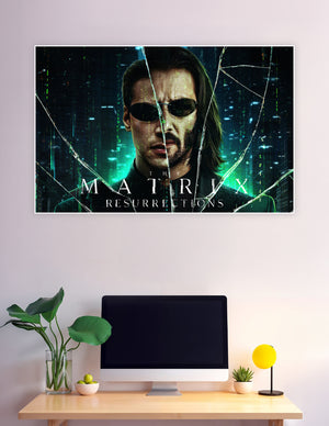 The Matrix Resurrections movie poster featuring Neo in dark sunglasses with a shattered glass effect and green digital cityscape background