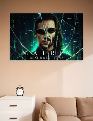 The Matrix Resurrections movie poster featuring Neo in dark sunglasses with a shattered glass effect and green digital cityscape background