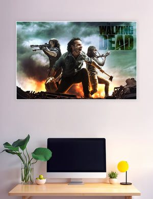 The Walking Dead promotional poster showing Rick Grimes, Daryl Dixon with crossbow, and Michonne with katana in front of fire and smoke with bold series title text
