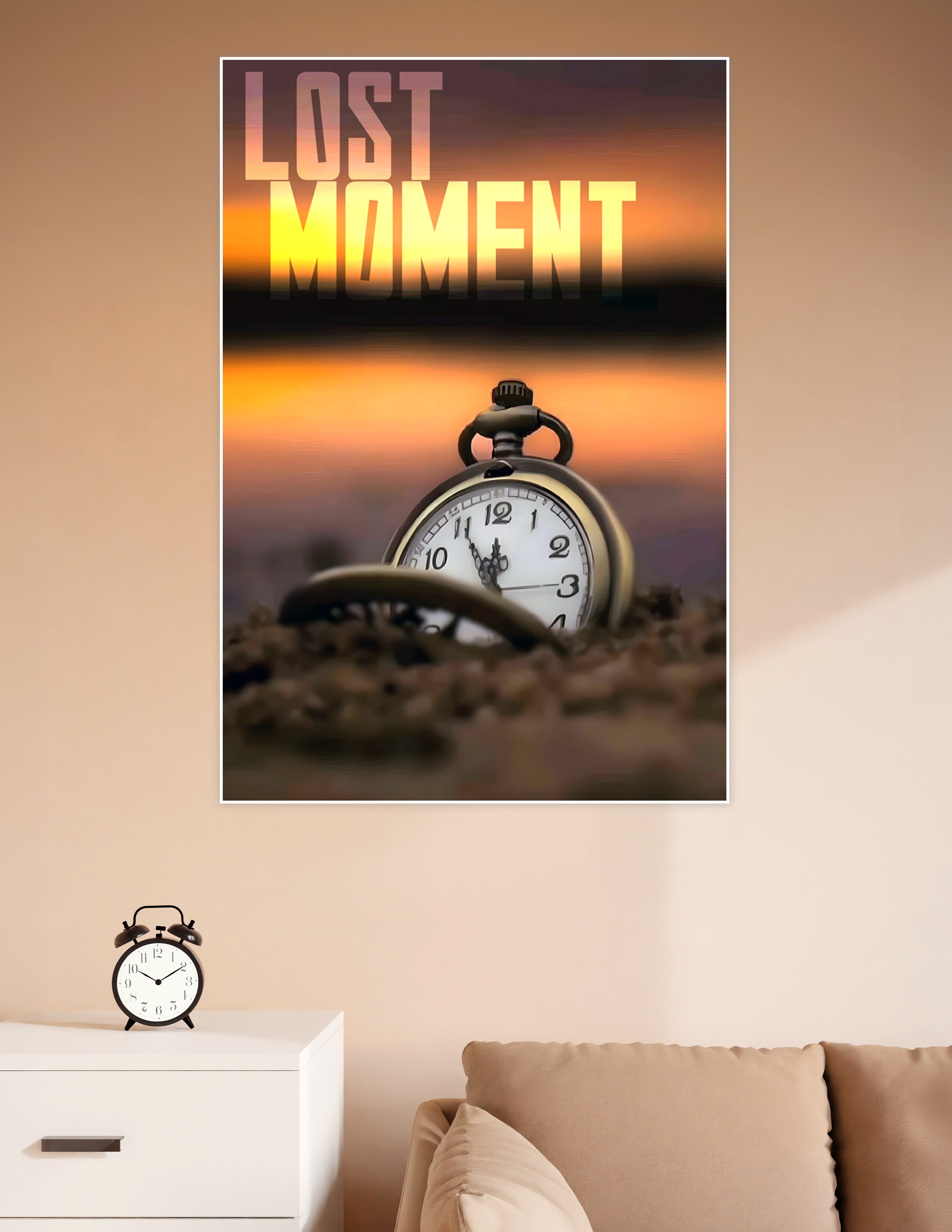 Lost Moment poster showing a vintage brass pocket watch half-buried in sand with a glowing orange and purple sunset sky in the background
