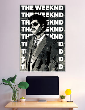 Black and white comic-style illustration poster of The Weeknd in a suit with sunglasses, surrounded by bold repeating THE WEEKND typography