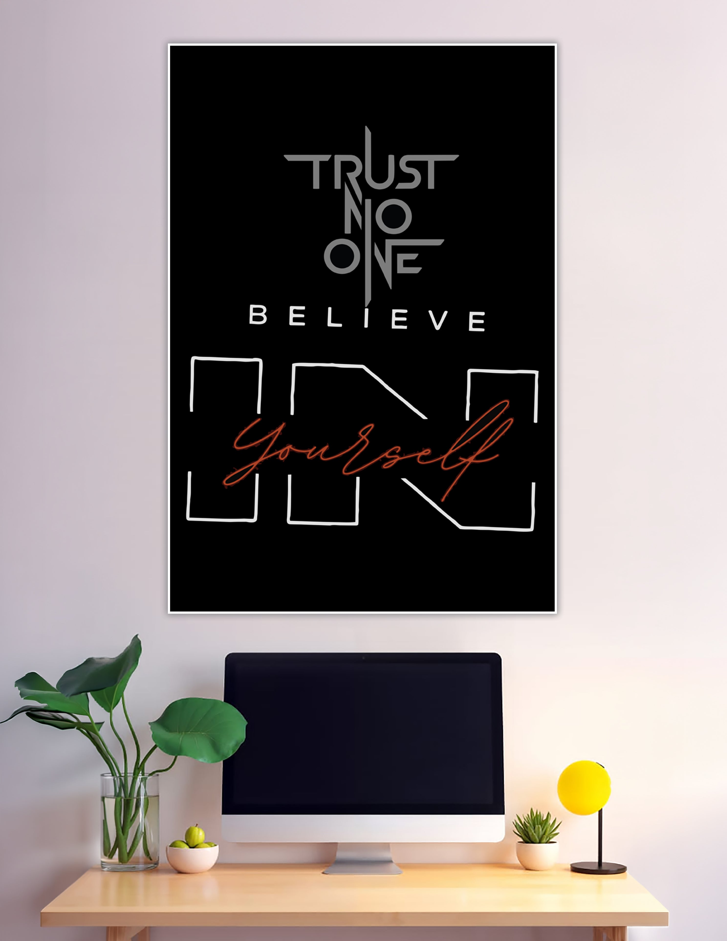 Black motivational wall poster with 'Trust No One Believe In Yourself' in bold grey and red script typography on a dark background