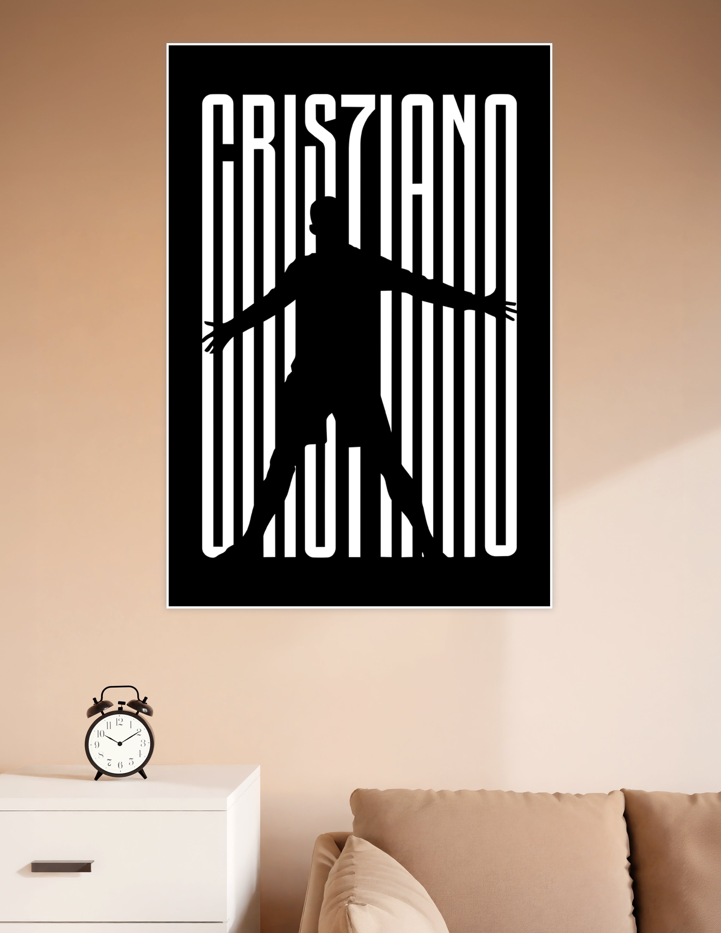 Black and white Cristiano Ronaldo CR7 celebration silhouette overlaid on bold typographic lettering spelling CRISTIANO on a dark background
