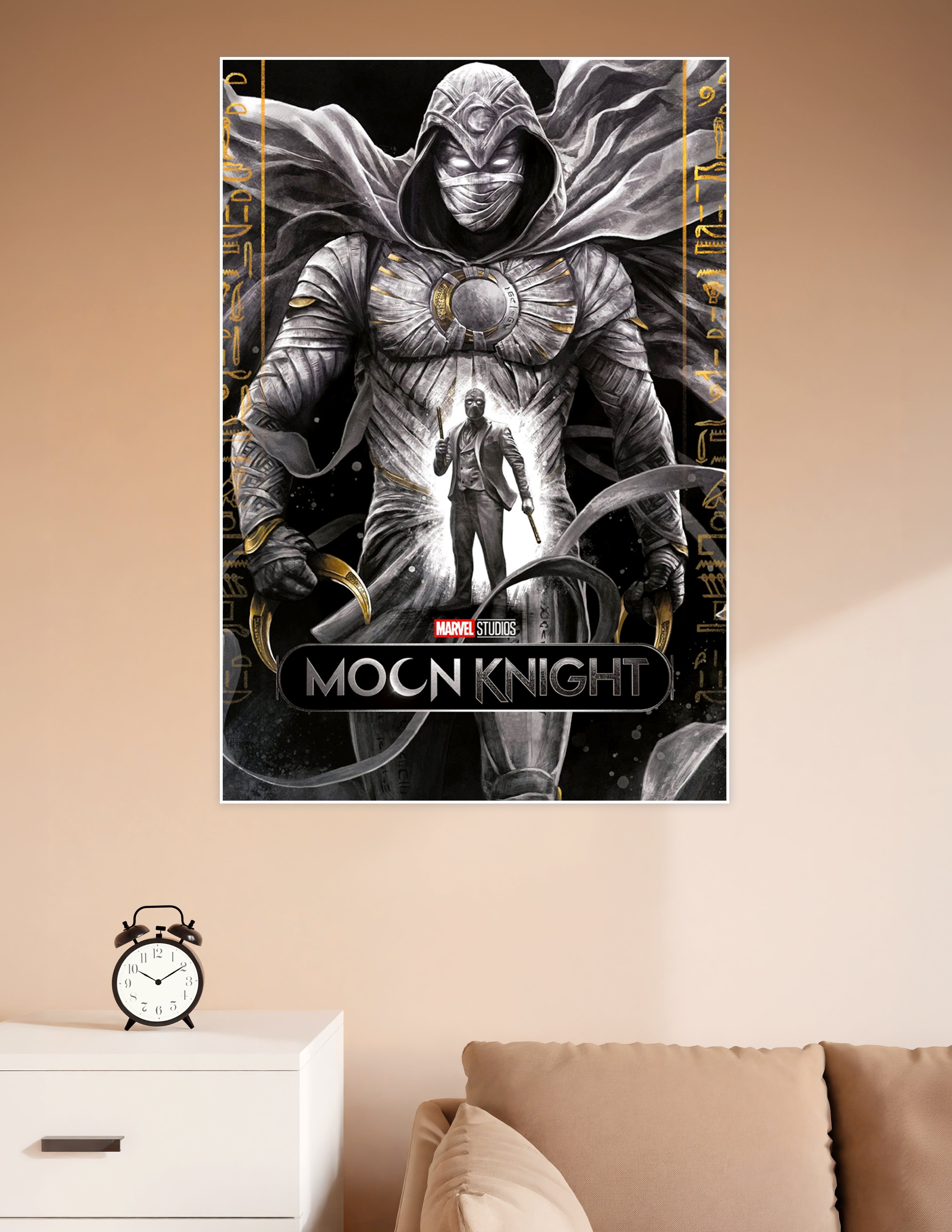 Moon Knight Marvel Studios poster featuring armored Moon Knight with glowing eyes, Egyptian hieroglyphic borders, gold accents, and alter ego figure in white suit
