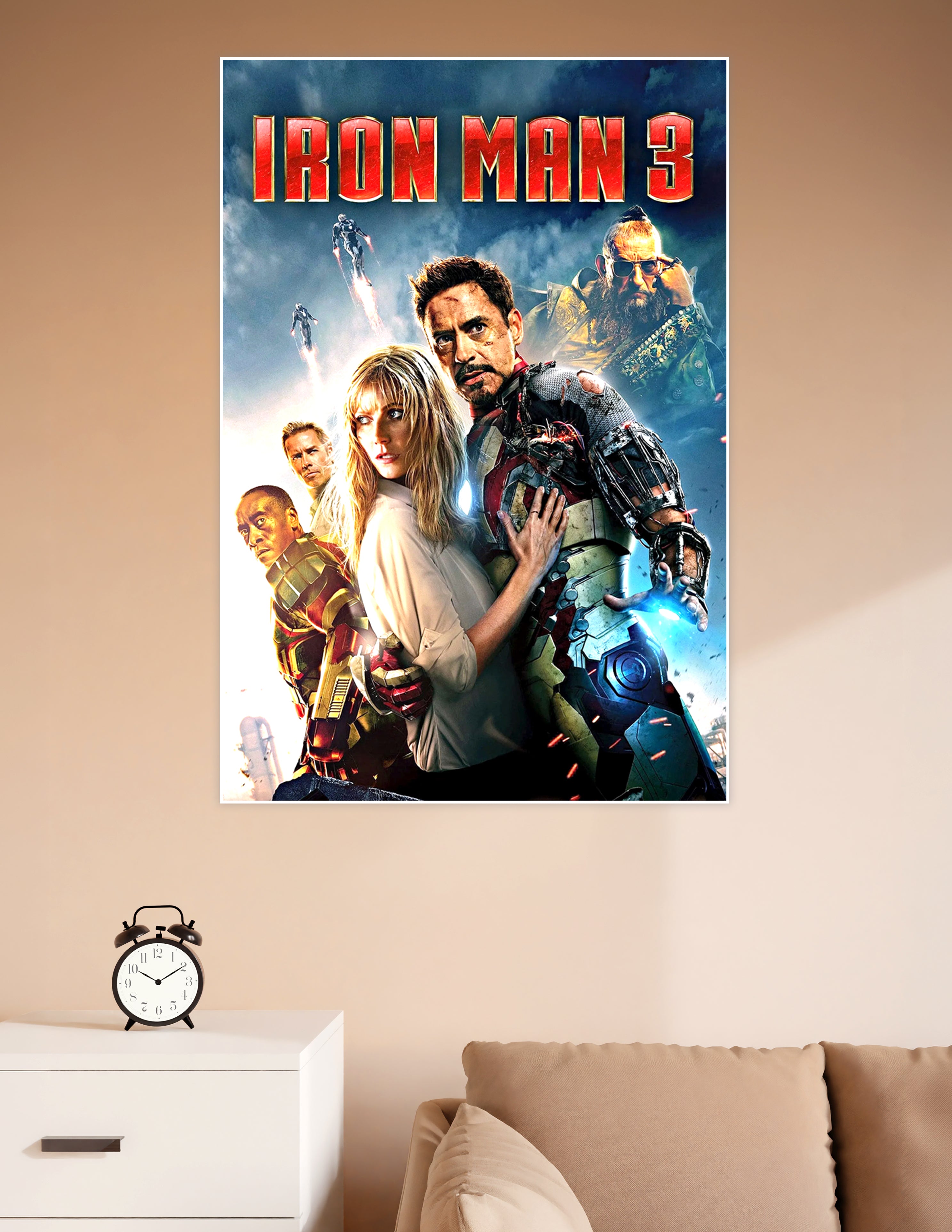 Iron Man 3 official movie poster featuring Tony Stark in battle-worn armor with key characters against a dramatic stormy sky background