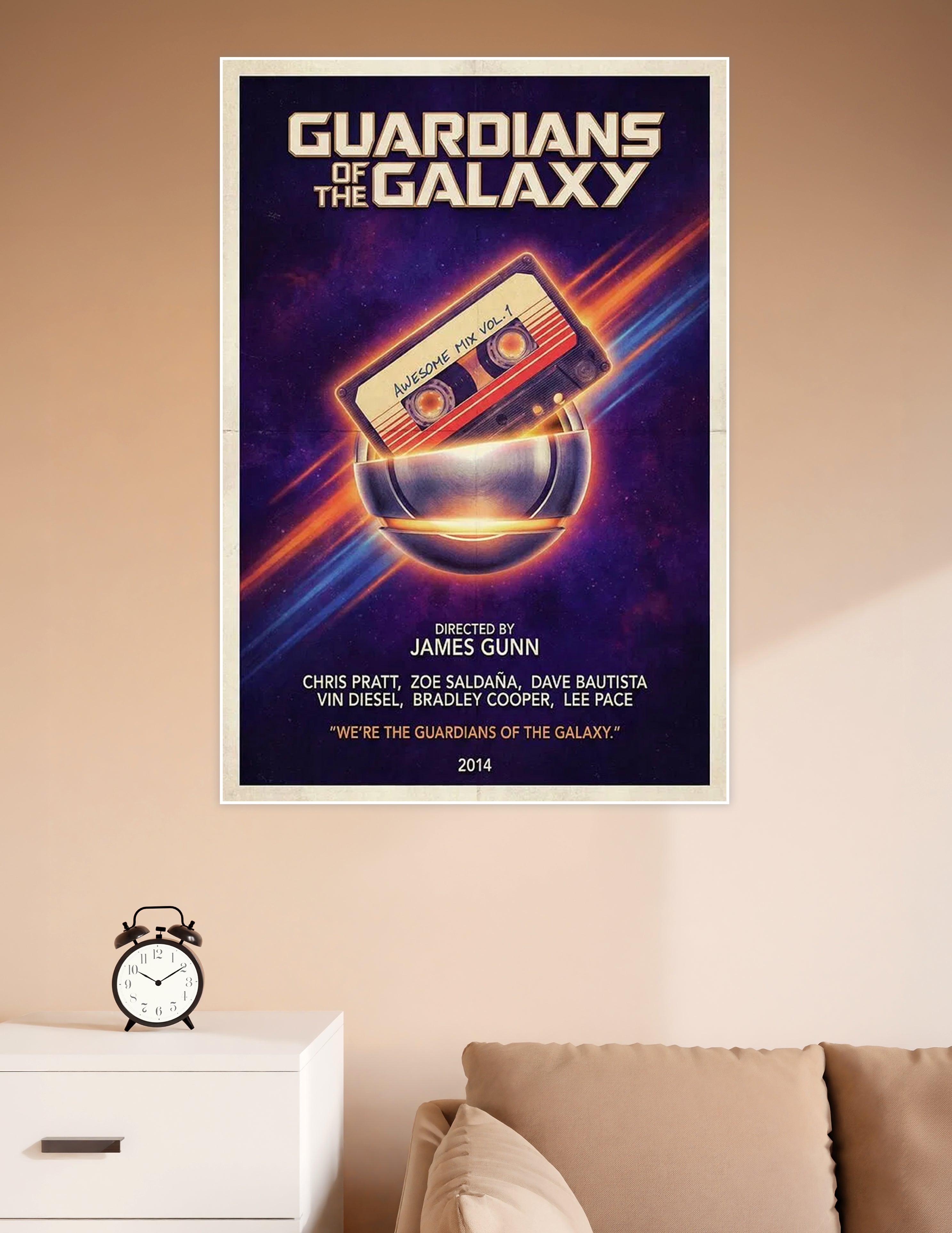 Guardians of the Galaxy 2014 movie poster featuring the Awesome Mix Vol. 1 cassette tape glowing against a purple cosmic space background, directed by James Gunn