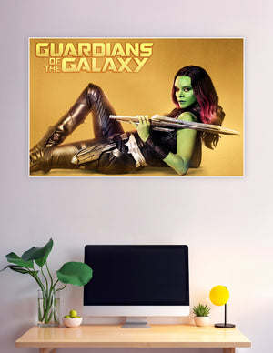 Gamora from Guardians of the Galaxy in black combat suit holding a sword against a golden background, official Marvel movie poster