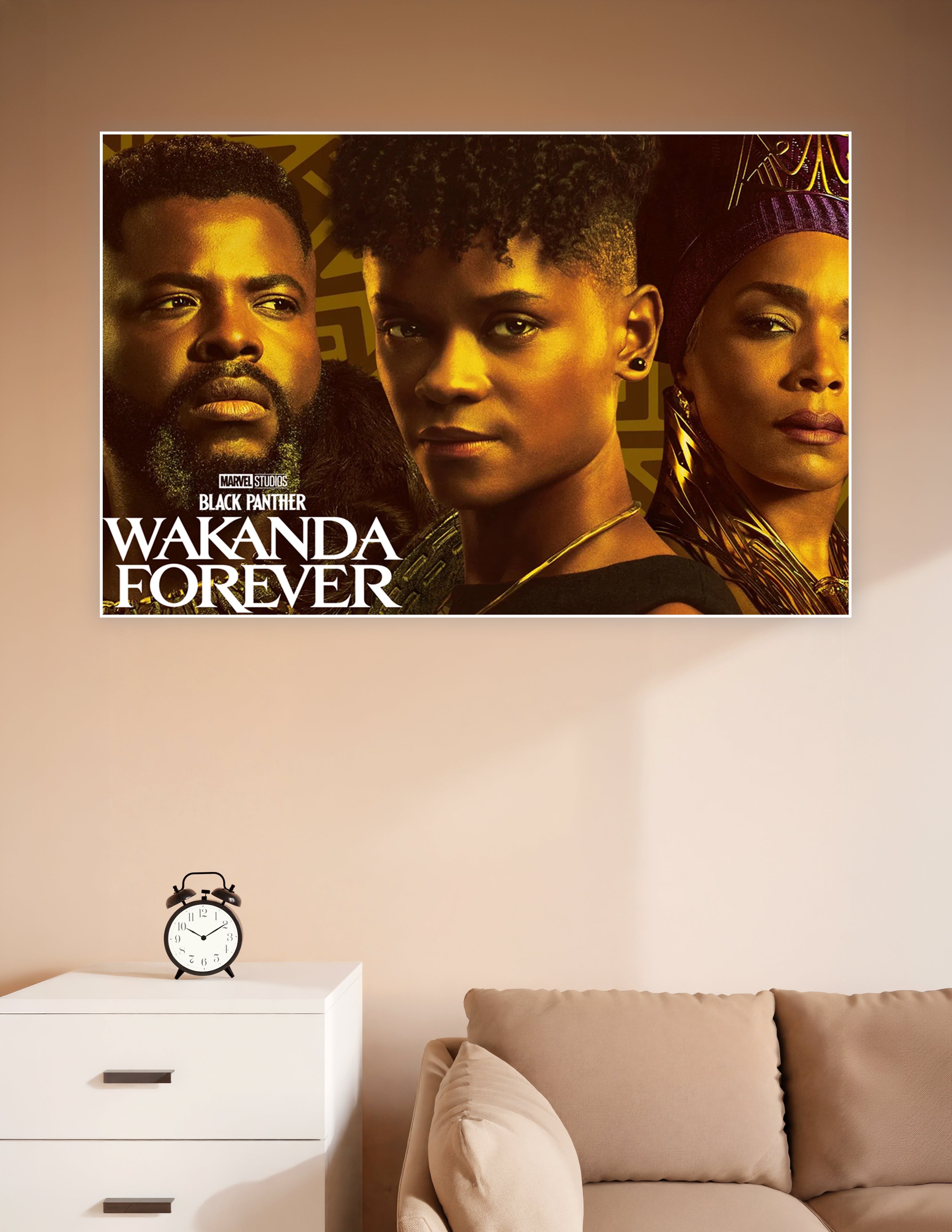 Black Panther Wakanda Forever Marvel Studios movie poster featuring three main characters in dramatic golden lighting