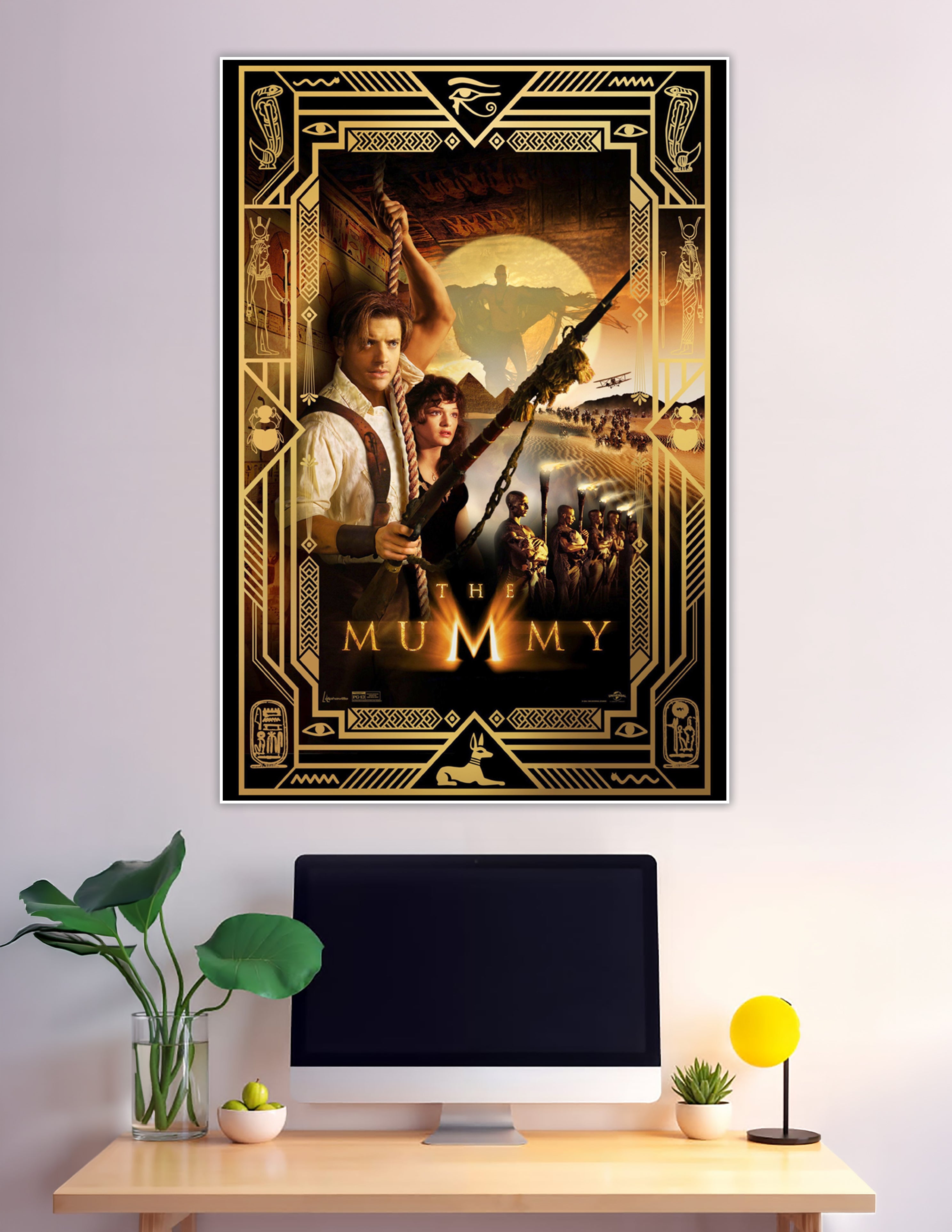 The Mummy 1999 movie poster with Egyptian gold border