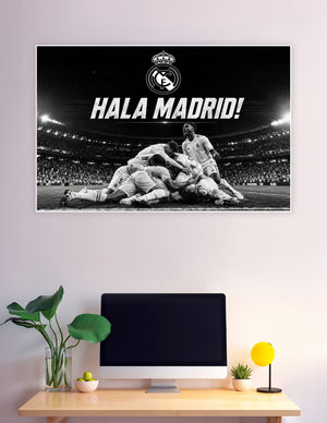 Real Madrid players celebrating goal with Hala Madrid text