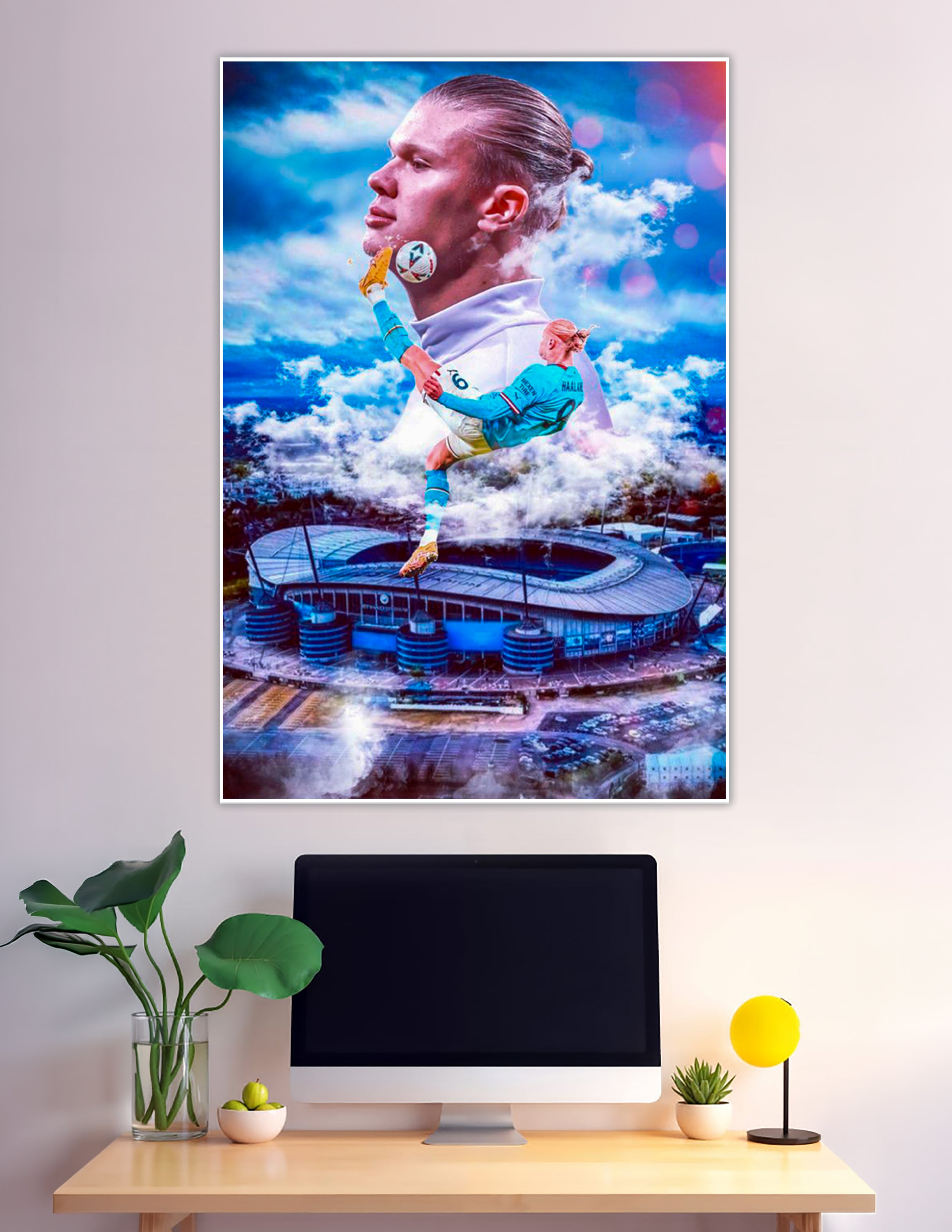 Erling Haaland giant surrealist poster above Etihad Stadium