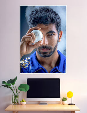 Cricket player holding white ball close-up portrait poster