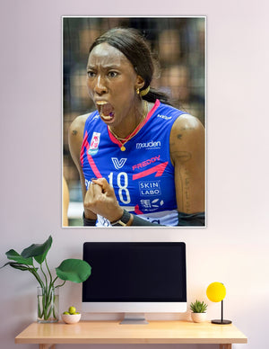 Fierce female volleyball player number 18 intense celebration