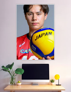 Japan national volleyball team player holding Mikasa FIVB ball