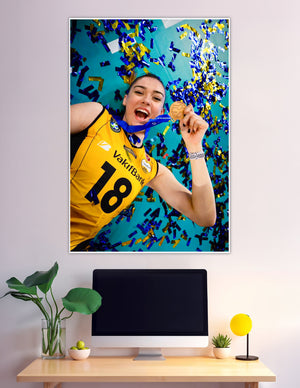 Volleyball player celebrating gold medal with confetti
