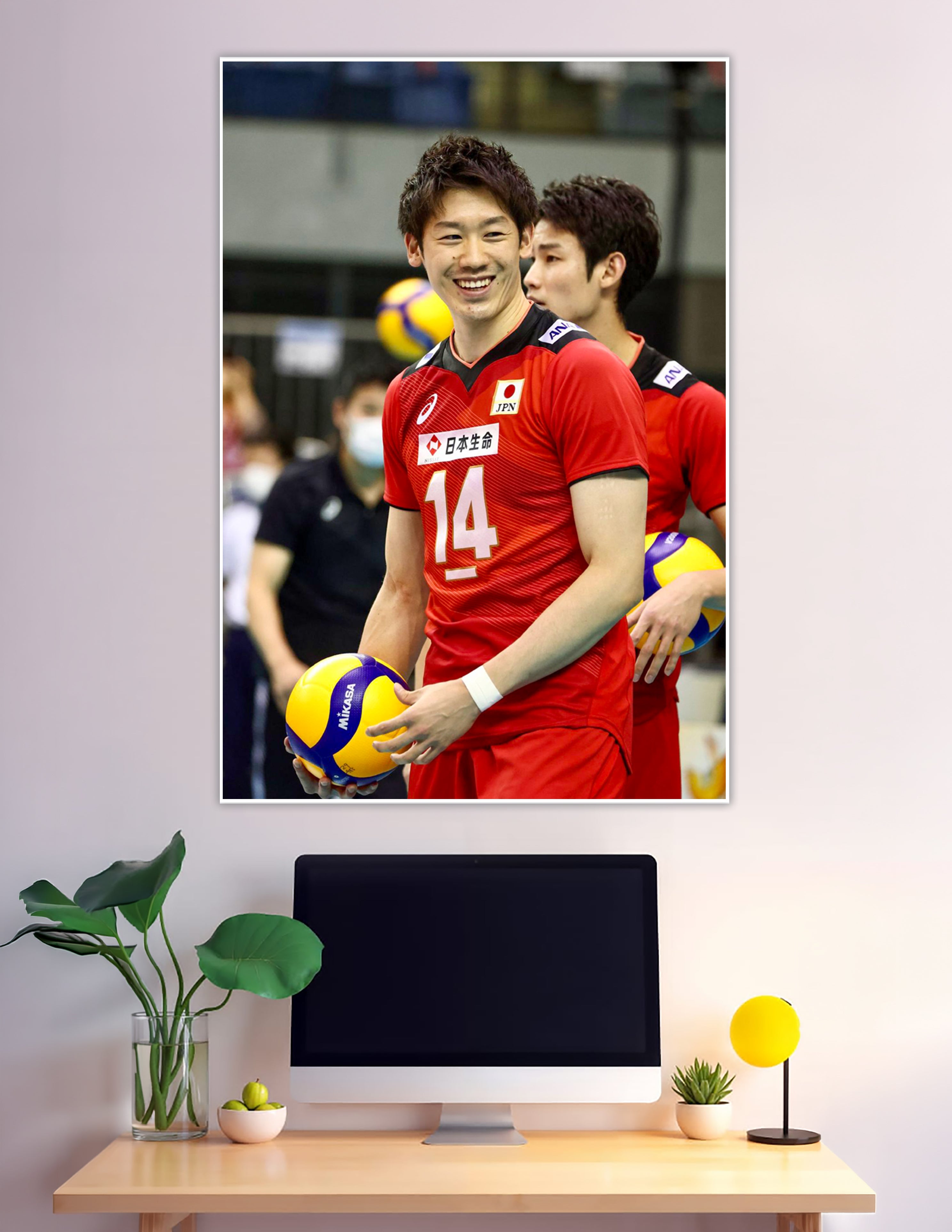 Japan national volleyball team player number 14 holding Mikasa ball