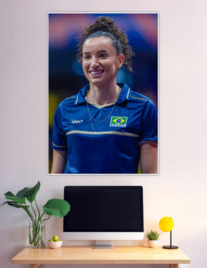 Smiling Brazilian female volleyball athlete in blue Brasil jersey