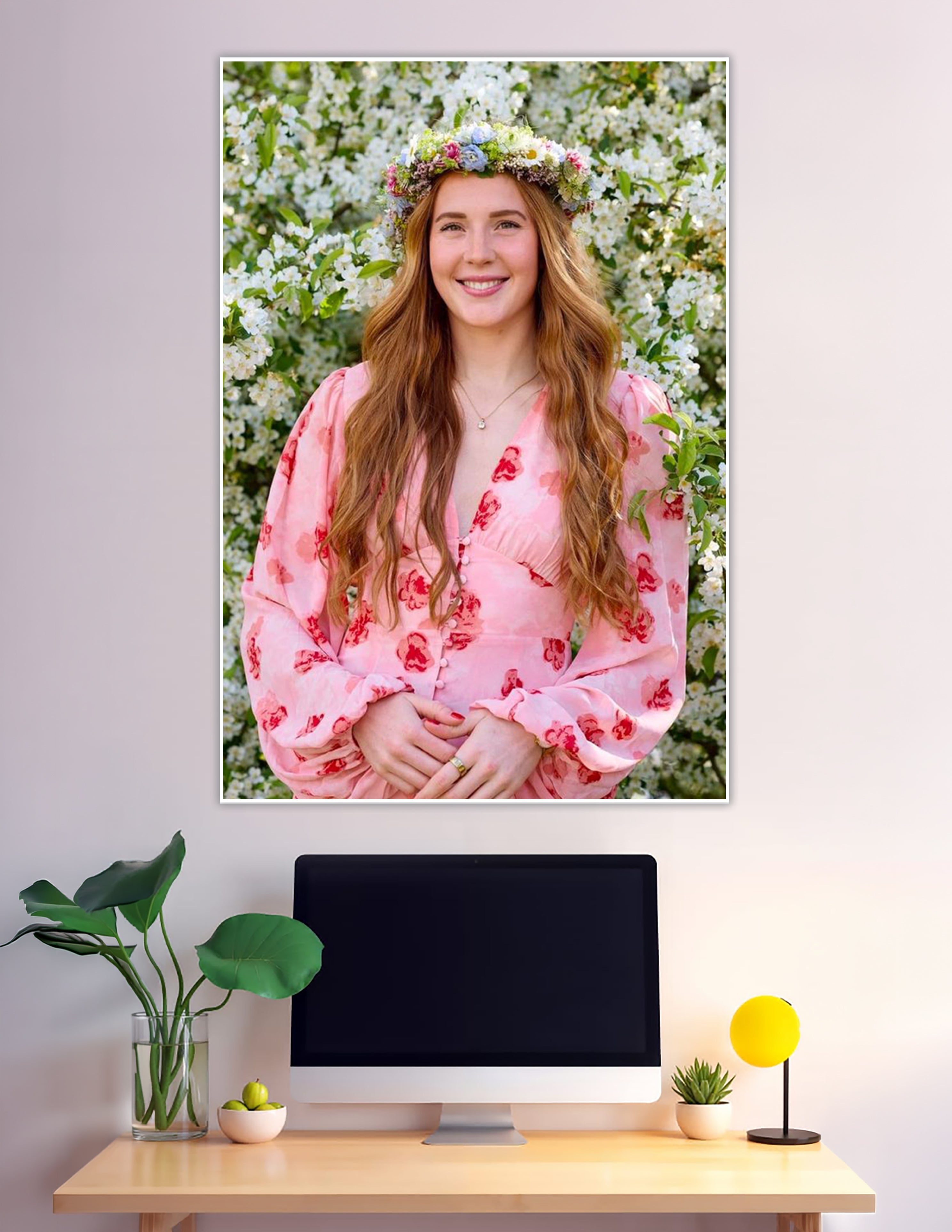 Smiling woman with floral crown among white blossoms