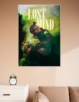 A young man with braided hair surrounded by swirling green smoke with bold 'Lost Mind' text overlay, urban street art poster